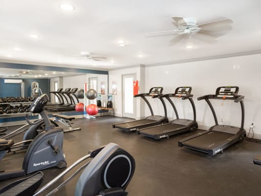 spacious fitness center at acadian point apartments
