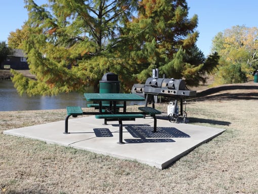 picnic and grilling area by the stocked fishing pond