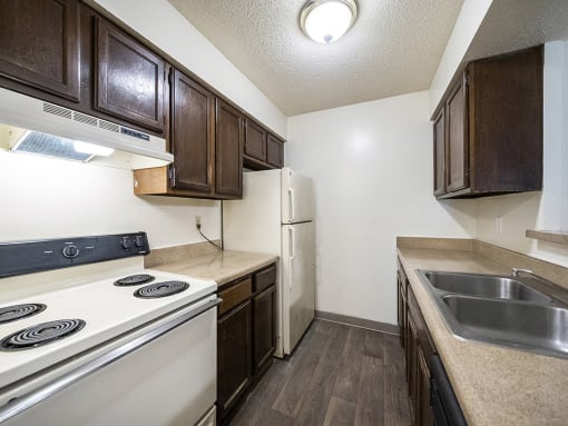 Apartment kitchen with dishwasher and cupboard space