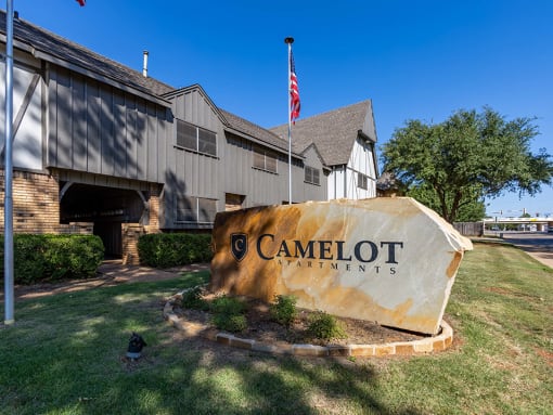 sign outside of camelot apartmetns