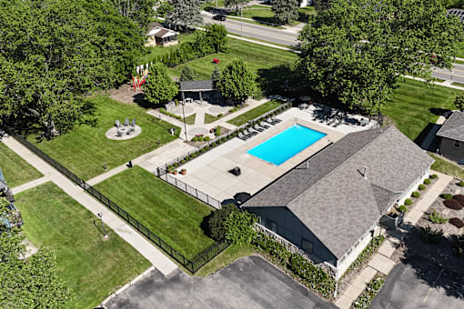 A house with a pool in the backyard.