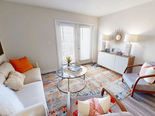 a living room with a couch and a table
