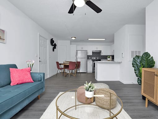 Apartment floor plan with a blue couch and a coffee table
