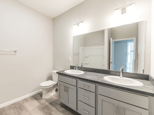 a bright, clean apartment bathroom