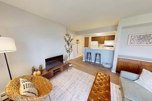 A living room with a fireplace and a couch.