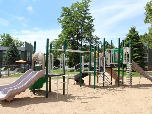 a playground with slides and climbing equipment