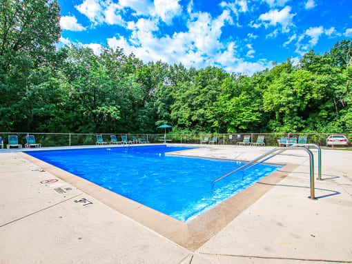 take a dip in the pool at Greenmar Apartments