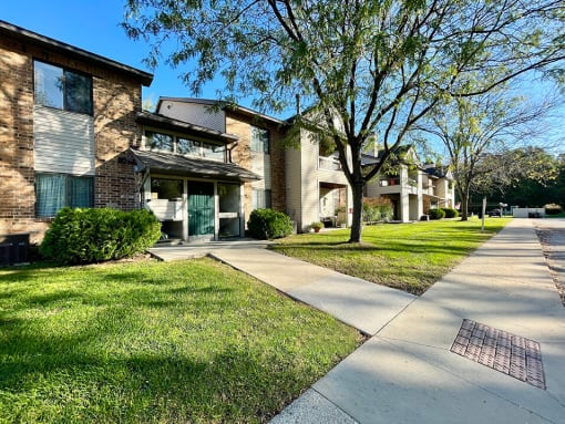 outside of apartment building, with sidewalk