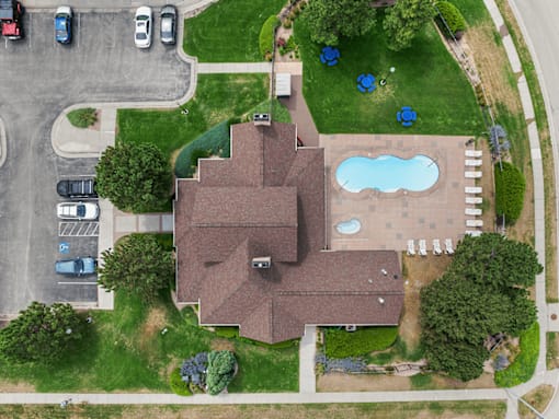 A house with a pool in the backyard.
