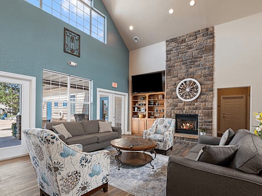 A living room with a fireplace and a couch.