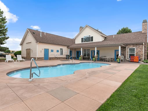 A house with a pool in the backyard.