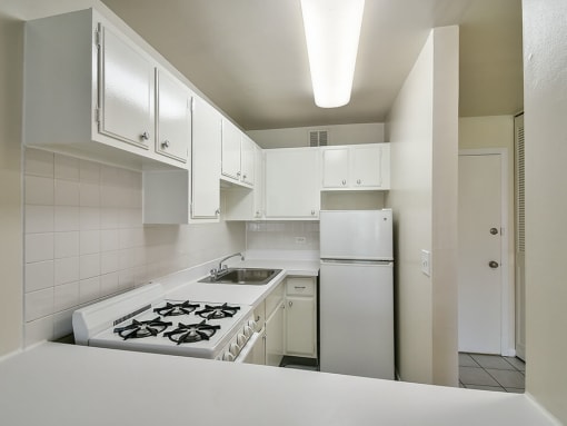 apartment with refrigerator and range