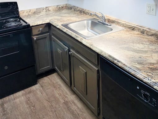 kitchen with dishwasher in Kettering 