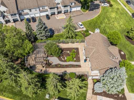 an aerial view of a home with a landscaped yard
