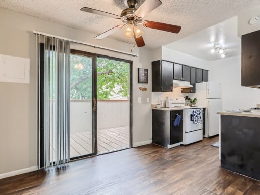 Dining area with overhead fan and light