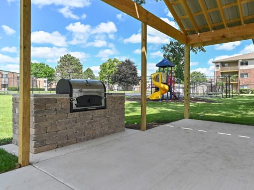 apartment complex with Grilling and Picnic Area