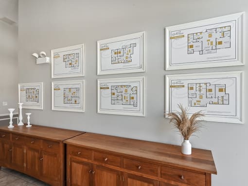 photos of apartment floor plans in the leasing office