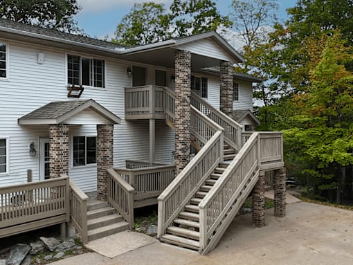 A house with a staircase leading to the second floor.