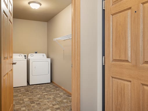 A laundry room with a washer and dryer.