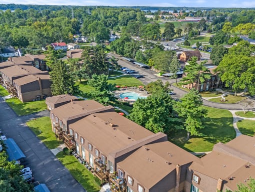 an aerial view of a group of houses in a neighborhood