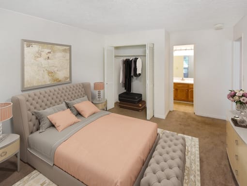 primary bedroom with attached bathroom