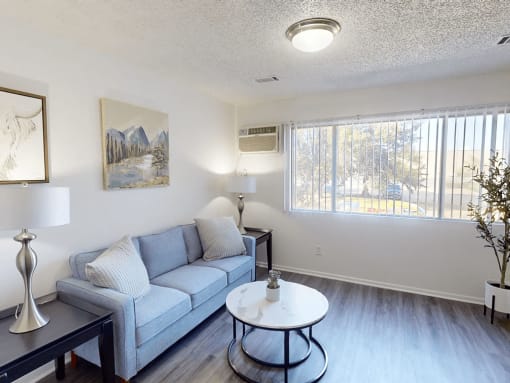 a living room with a couch and a table