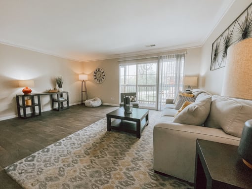 a living room with a couch and a table