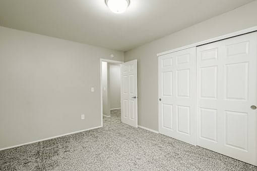 A white door is on the right side of the image.
