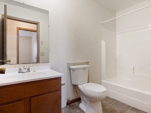 a bathroom with a toilet and a sink