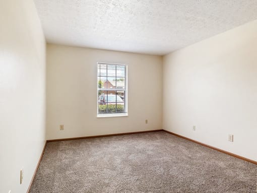 apartment bedroom with carpet