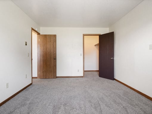 bedroom with a walk in closet
