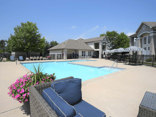 Lounge and pool area at apartment in Norton Shores, MI