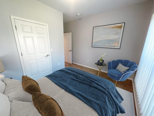 spacious bedroom with natural light at shoreline landing apartment