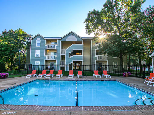 outdoor swimming pool with at an apartment building