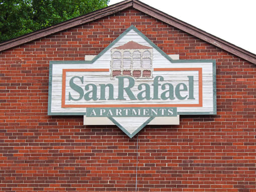 a building with a sign that says san rafael apartments