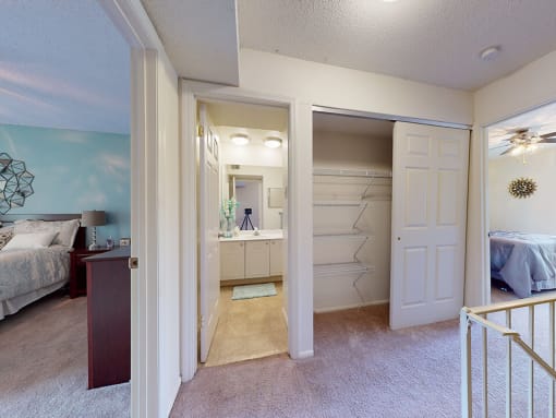 apartment bedroom with a connected bathroom
