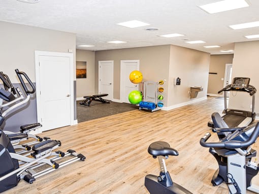 Gym at silver lake apartments with exercise equipment