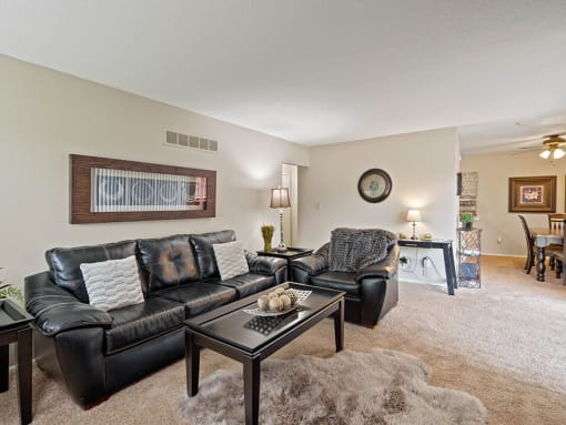 a living room with a couch and a table