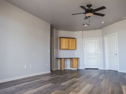 living room with a ceiling fan