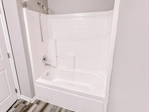 a small bathroom with a shower and a toilet