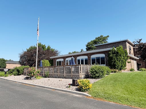 A building with a flag on top of a pole.
