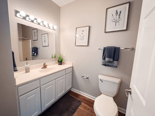 a spacious bathroom with large vanity space.