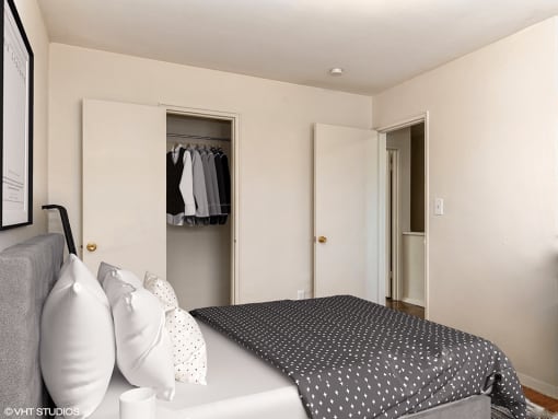 apartment bedroom with a closet