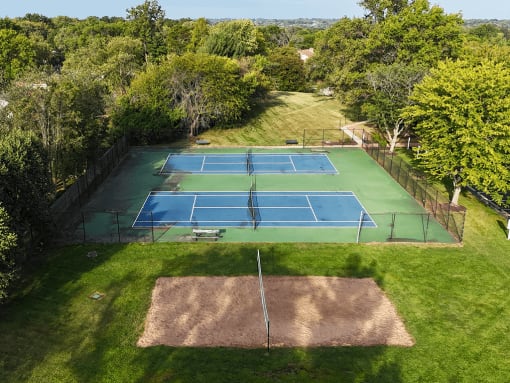 aerial view of a tennis court at apartment community