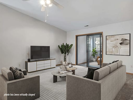 Apartment living room with a door to patio