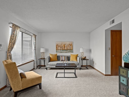 a living room with a couch and a table