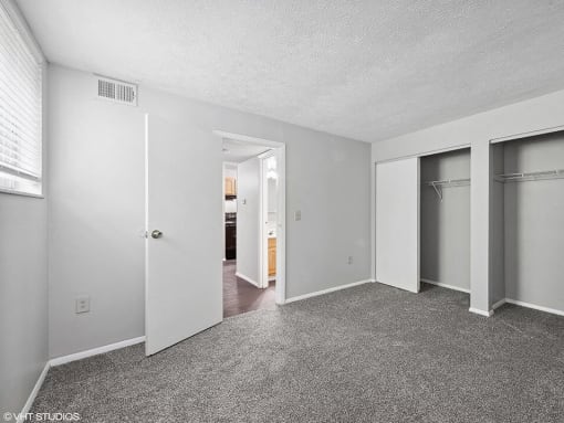 apartment bedroom with a closet