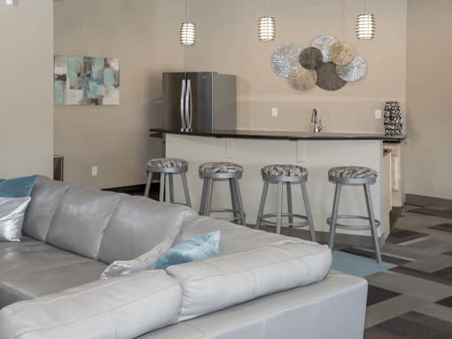 Kitchen area with barstools at windsor gates apartments