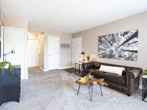 a living room with a couch and a coffee table