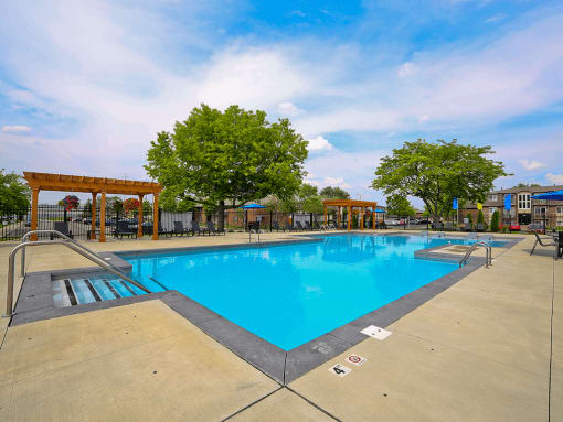 the swimming pool at the Westminster apartments and Townhomes
